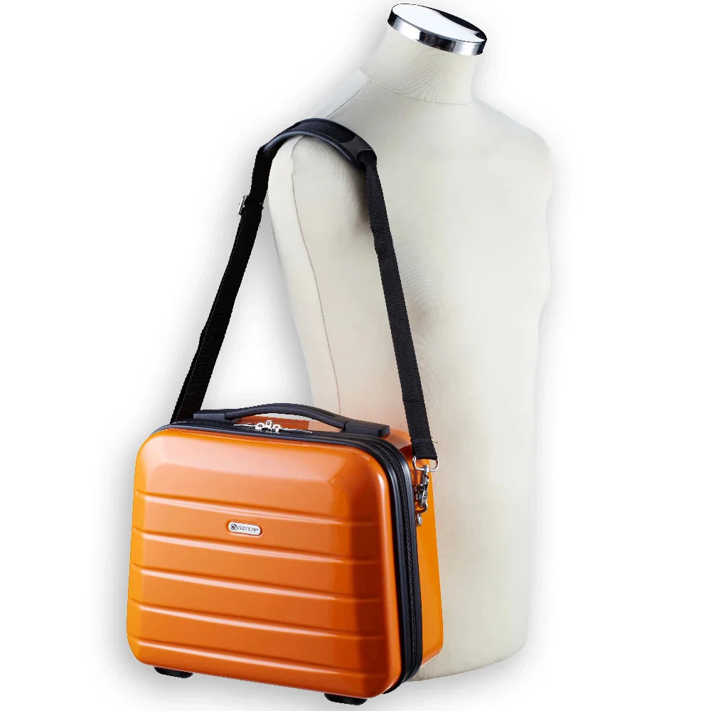 Check In London 2.0 Kosmetikkoffer 33 cm - orange, mit Schultergurt an Puppe hängend, Frontansicht